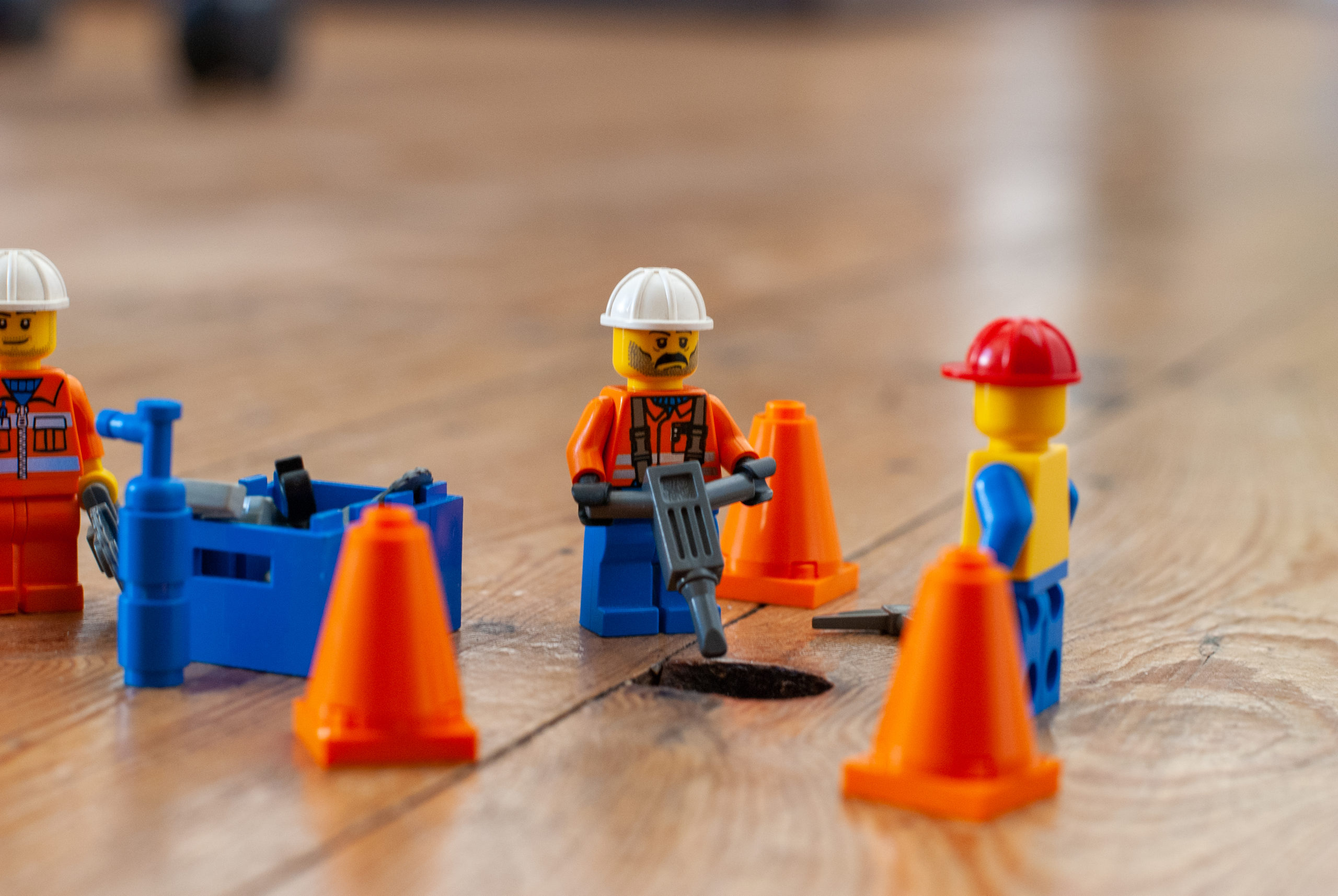 LEGO workers digging a hole